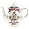 Angle of Queen Victoria fine porcelain teapot with a design featuring Queen Victoria's name cipher and a coronet surrounded by floral patterns and gold plated rims. thumbnail