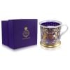 Gold, purple and light blue tankard with the lion and unicorn crest at the centre of the tankard. Next to the tankard is the purple presentation box. thumbnail