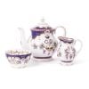 The full Queen Victoria fine porcelain tea set with a design featuring Queen Victoria's name cipher, gold plated rims and floral patterns. The range includes teapot,  cream jug and sugar bowl.  thumbnail