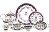 The full Queen Victoria fine bone china tea set with a design featuring Queen Victoria's name cipher, gold plated rims and floral patterns. The range includes teapot, teacup and saucer, cream jug, sugar bowl, side plate, candy basket and dinner plate. thumbnail