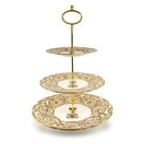 Victoria and Albert English fine bone china three tier cake stand featuring the ciphers of Queen Victoria and Prince Albert surmounted by a royal crown and surrounded by intricately ornated gold patterns.