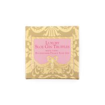 A golden patterned box with a pink centre with dark pink text, with "Luxury Sloe Gin Truffles, nade using Buckingham Palace Sloe Gin" in writing. 