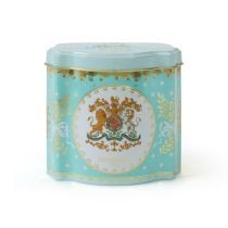 Mint green tin containing peppermint tea with the Royal Coat of  Arms crest