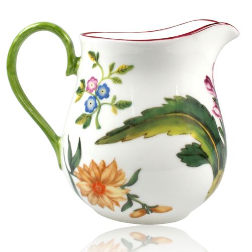 Chelsea Porcelain Cream Jug with a design featuring a botanical pattern on the inner and outer side. 