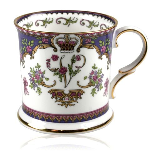 Queen Victoria Tankard with design featuring Queen Victoria's name cipher surrounded by floral patterns and gold plated rims.