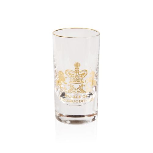 Clear glass tot glass with a 22 carat gold rim and 22 carat gold Lion and unicorn crest and the words 'Palace of Holyroodhouse'