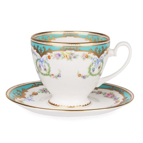 Great Exhibition fine bone china teacup and saucer with a design featuring gold plated rims, gold decorative and pastel coloured floral patterns on both parts.