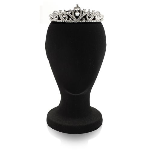 Crystal metal tiara featuring a central crystal bead drop surrounded with embeded sparkling crytals over an ornated band with wave form shapes.  