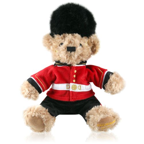 Royal Guardsman Teddy Bear plush toy for children featuring a scotsguard uniform and bearskin hat inspired on The Queen's Guards livery at Buckingham Palace. 