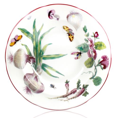 Chelsea Porcelain soup plate with a design featuring botanical patterns.