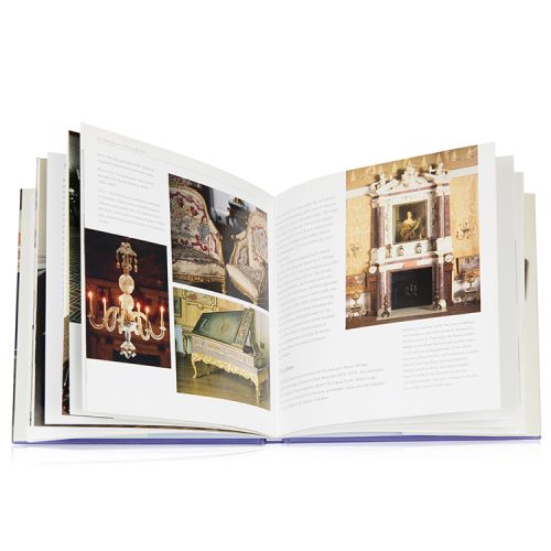 The front cover and open book view of The Queen's Dolls' House Book by Lucinda Lambton. 