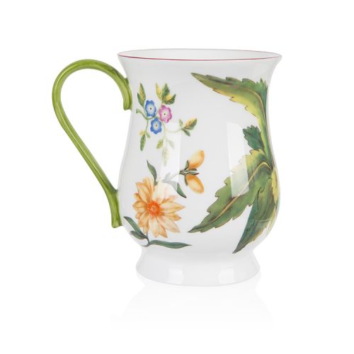 A white mug with the Chelsea Porcelain design printed on it. The design includes flowers and butterflies