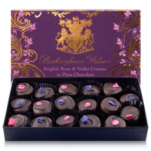 Buckingham Palace branded English rose and violet creams displayed in a ornate gift box and containing 17 individually wrapped chocolates. 