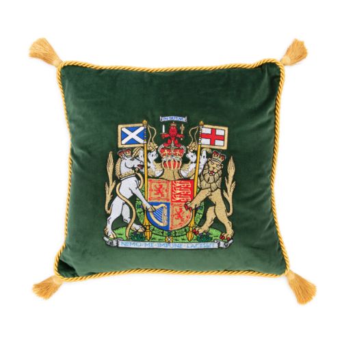 Green velvet cushion with a gold edge and gold tassels. At the centre of the cushion is the Scottish coat of arms featuring a lion and unicorn and the Scottish and English flags.