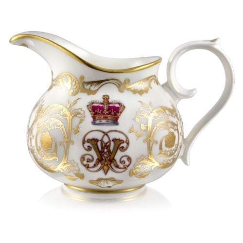 Victoria and Albert English fine bone china cream jug featuring the ciphers of Queen Victoria and Prince Albert surmounted by a royal crown and surrounded by intricately ornated gold patterns.