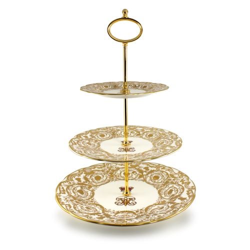 Victoria and Albert English fine bone china three tier cake stand featuring the ciphers of Queen Victoria and Prince Albert surmounted by a royal crown and surrounded by intricately ornated gold patterns.