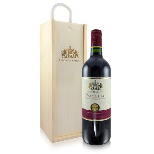 Wooden wine box stamped with gold Buckingham Palace and Motif. Bottle of Pauillac with white, Buckingham Palace label and maroon accents on lid and label. 