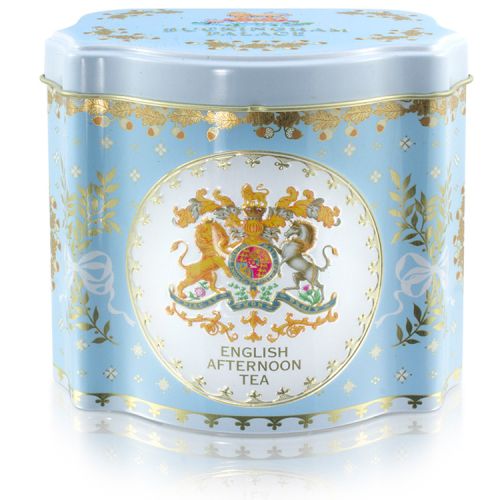 Open tin with view of round tea bags inside. 