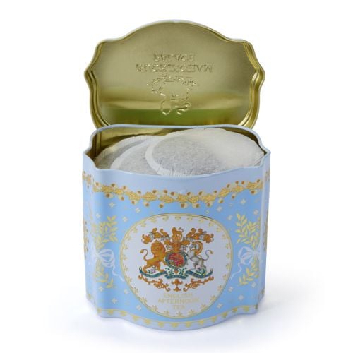 Blue tin tea caddy decorated with the Royal Coat of Arms, a crown, foliage with ribbons and a touch of gold.