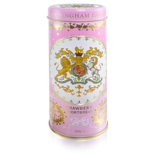 pink biscuit tin with the crest at the centre of the tin. Stood next to a tower of strawberry biscuits