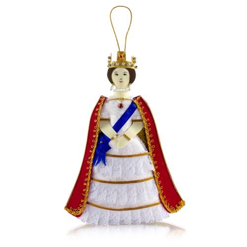 Fabric decoration of Queen Victoria wearing a white dress, blue sash and red and gold robe. Finished with a crown and gold string to hang from a tree.