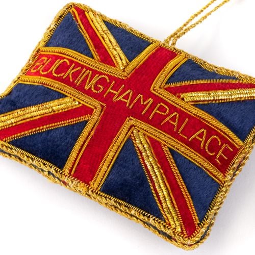 union jack flag Christmas decoration embroidered with gold threads and beads. 'Buckingham Palace' has been embroidered in the centre in gold beads