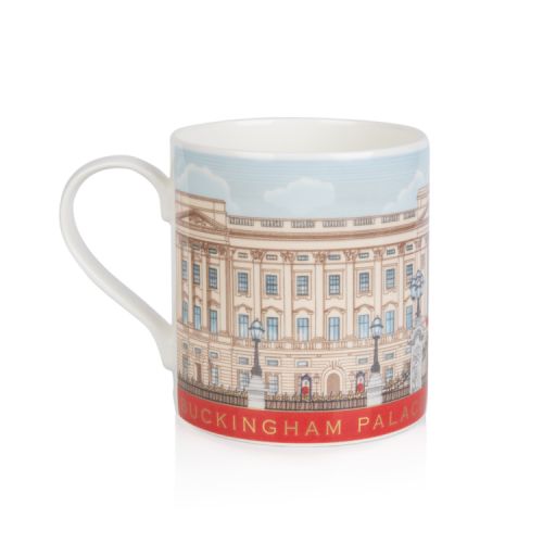 White mug with illustration of Buckingham Palace wrapping around the entire mug. Red strip at bottom with gold lettering that says 'Buckingham Palace'.