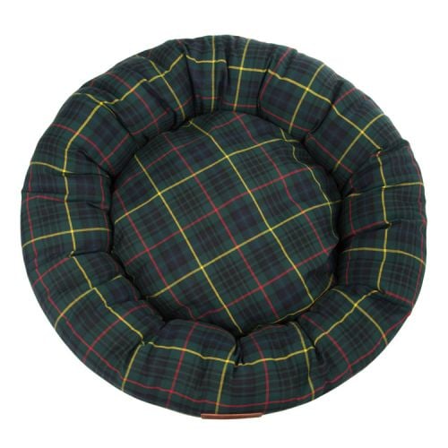 Tartan circular dog bed with a brown leather tag sewn to the front engraved with the words 'Buckingham Palace'
