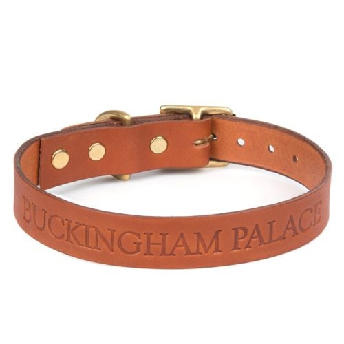 Brown leather collar engraved with the words 'Buckingham Palace'