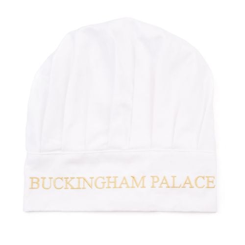 White chefs hat with Buckingham Palace embroidered in gold.