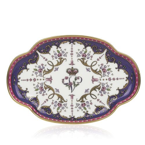 Queen Victoria design. With Queen Victoria's initial at the centre, it is surrounded by purple, pink and gold floral and intricate design
