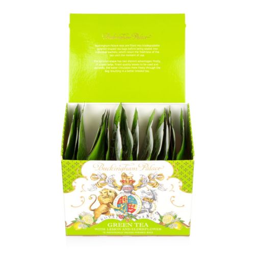 green and white cardboard box of green tea with lemon and elderflower infusion teabags with a detail image of the crest on the front open displaying individual packets of teabags