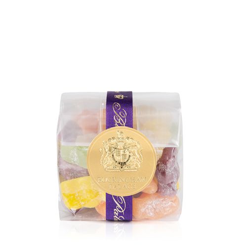 jelly babies in a clear bag with a purple ribbon and a gold seal