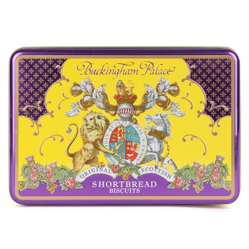 Open purple and yellow tin of shortbread biscuits. The lid features the lion and unicorn crest