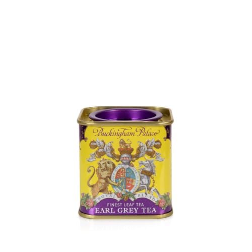 Small tin Earl Grey Tea tea caddy with a purple and yellow design and a lion and unicorn crest at the centre of the design