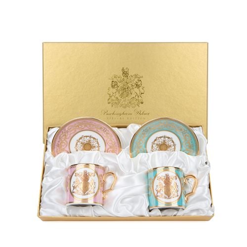 Pink coffee cup and green coffee cup with Hanoverian coat of arms in 22 carat gold and gold handles 