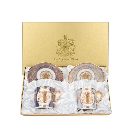Pale blue coffee cup and purple coffee cup with Hanoverian coat of arms in 22 carat gold and gold handles 