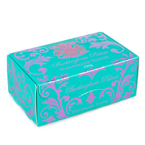 blue and purple box of toffees with a lion and unicorn crest. The words 'Buckingham Palace' are printed on top in purple writing
