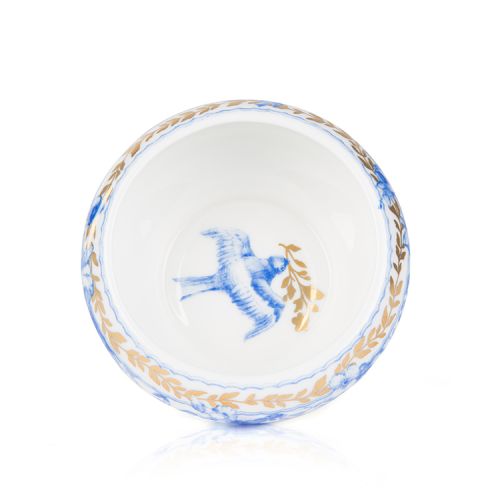 White pillbox with a blue floral garland and bird design and finished with gold detail and gold edge of the pillbox lid