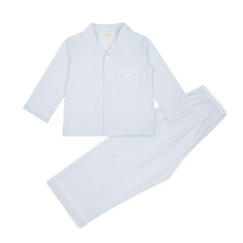 pale blue cotton pyjamas set. A blue shirt with white buttons up the front and pale blue cotton trousers 