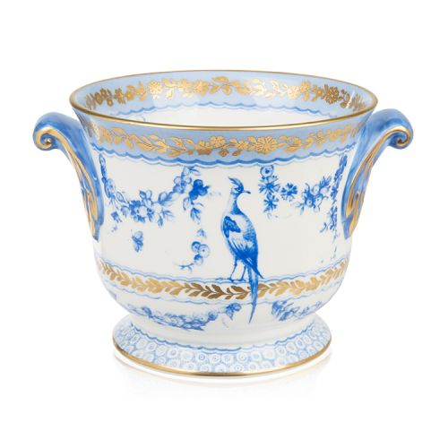White cache pot with a blue floral garland and bird design and finished with gold detail and gold edge of the cache pot