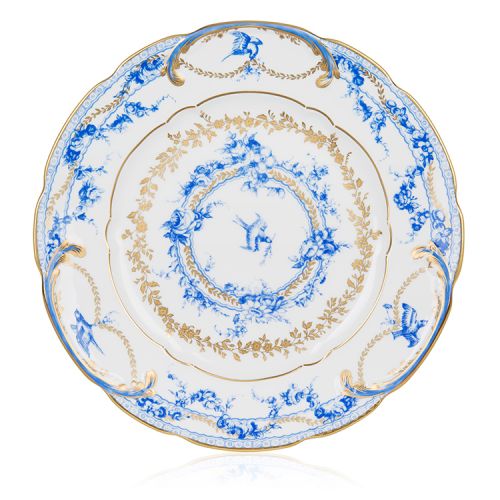 White dinner plate with a blue floral garland and bird design and finished with gold detail and gold edge of the dinner plate