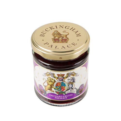 glass jar of orchard fruit jam with a purple and white label with the lion and unicorn crest at the centre