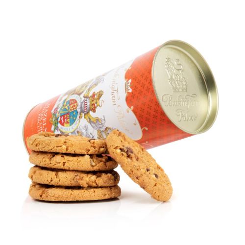 Orange cardboard tube of Hazelnut and dark chocolate biscuits. The lion and unicorn crest is at the centre of the design underneath the words 'Buckingham Palace'