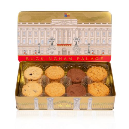 Open rectangular tin of assorted biscuits. On the lid is an illustration of the façade of Buckingham Palace.