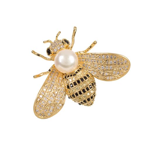 gold bee brooch with a pearl centre and black and gold coloured jewels