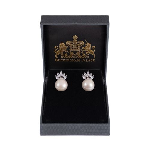 pearl earrings with crystal crown surmounted on the pearl