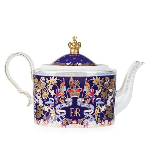 Purple teapot with the Longest Reining Monarch design. With the lion and unicorn crest, gold crown lid and white handle and spout