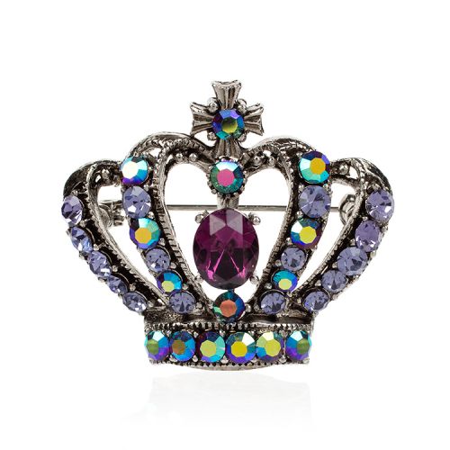 Purple crystal crown brooch featuring a larger faux purple crystal at the centre.