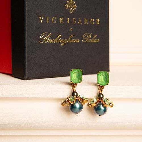 Green crystal stud with a green faux pearl drop topped with green crystal.